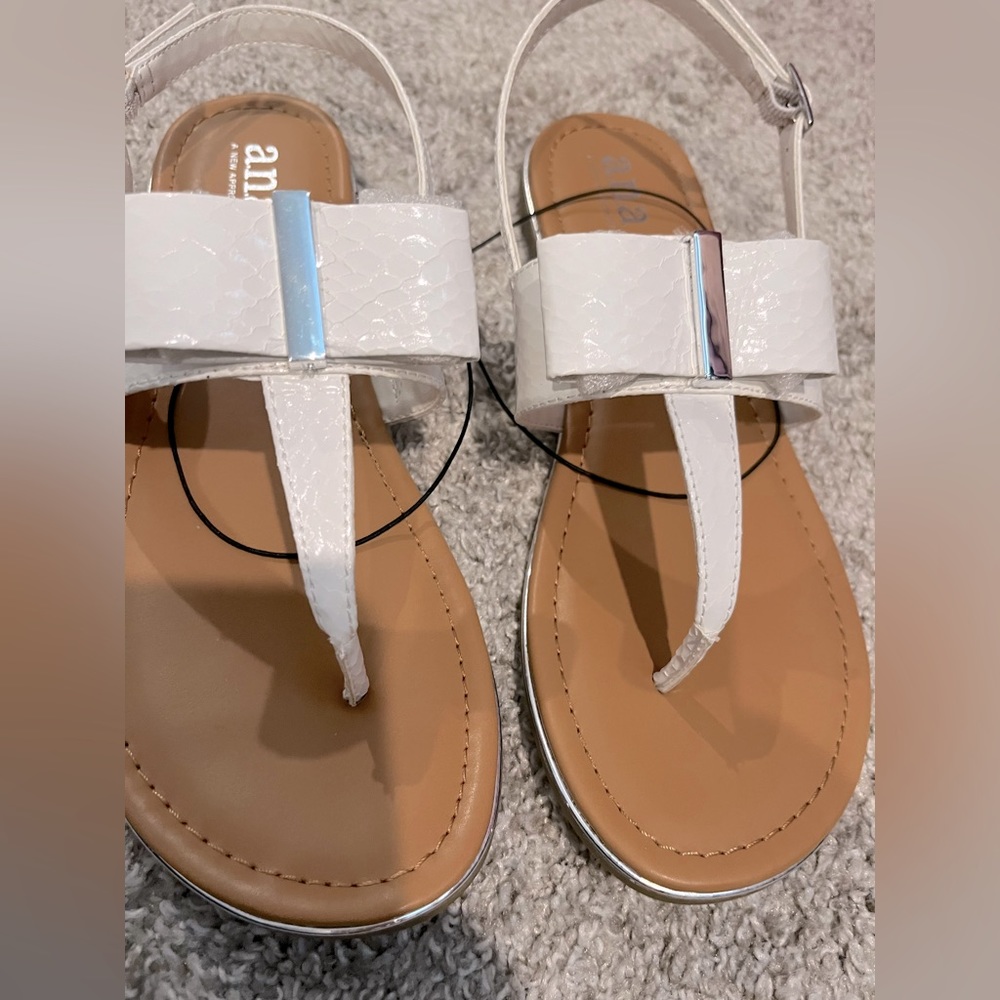 Cutest NEW Bow sandals white with silver detail.Size 10